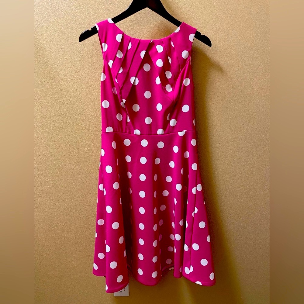 Knee- length dress in hot pink.